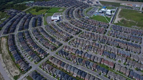Real estate project construction site in America. Townhouses and Housing bu.. Stock Footage 346728566