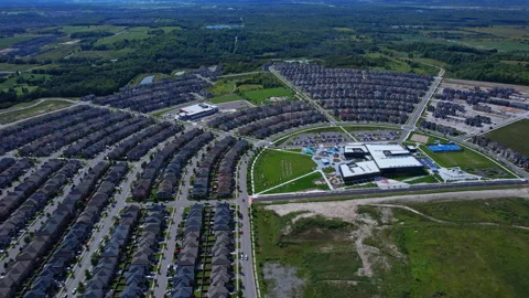 Real estate project construction site in America. Townhouses and Housing bu.. Stock Footage 346728618