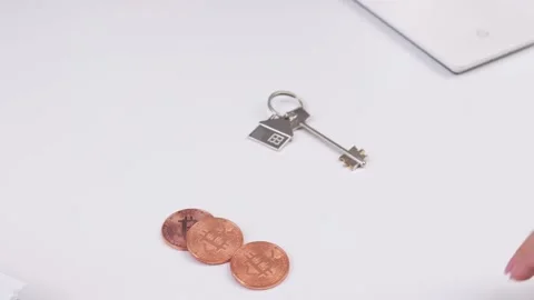 Real estate purchase deal. Using bitcoins as payment for real estate Stock Footage 176862292