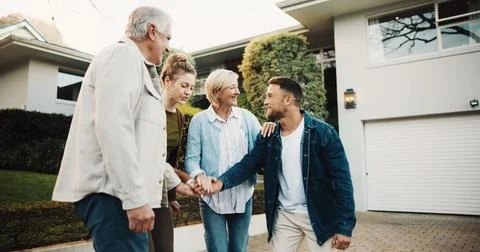 Real estate, smile and stack of hands with family at new home for celebrati.. Stock Photos