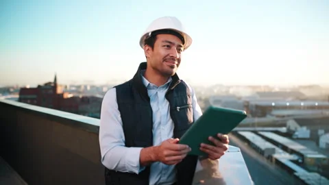 Real estate, tablet and thinking with architect on rooftop for city planning or Stock Footage 337925600