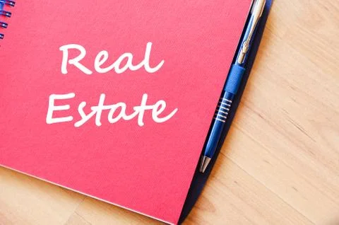 Real estate write on notebook Stock Photos