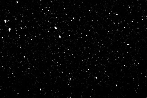 Real falling snow texture isolated on black background Stock Photos