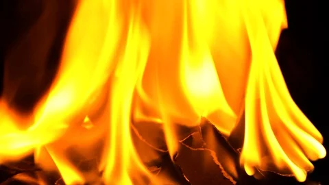 Real Fire Burning Black Paper 4k Stock Footage 94402155