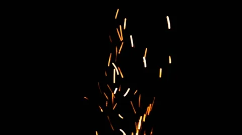Real Fire Sparks of a Bonfire Burning on a Black Background Stock Footage 56268000