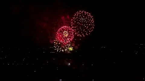 Real fireworks background. abstract blur of real golden shining fireworks with Stock Footage 154585039