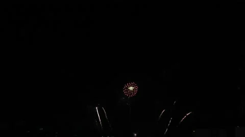 Real fireworks on dark background at night with multicolor and pattern Stock-Footage 155348798