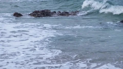 Real Footage of Waves, Rocks, and Ocean at the Shoreline Stock Footage 304232425