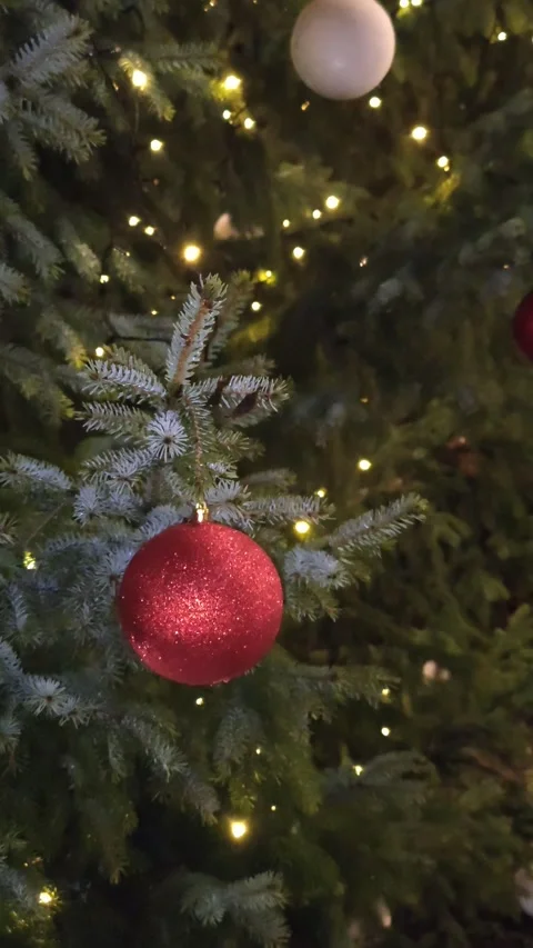 A real green New Year tree with bright toys and balls Stock Footage 323394972