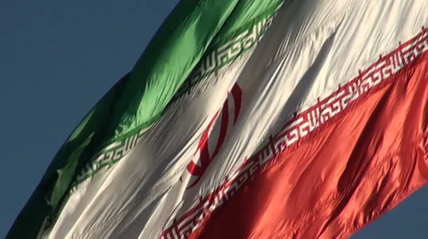 Real Iranian flag waving in the wind, Tehran, Iran Stock Footage