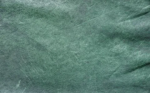 Real leather texture showcasing a unique green hue with a smooth finish Foto stock