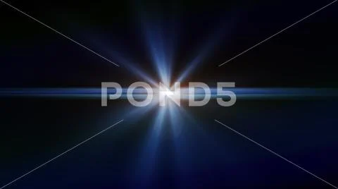 Real Lens Flare Shot in Studio over Black Background. Easy to add as Overla.. Stock Photos