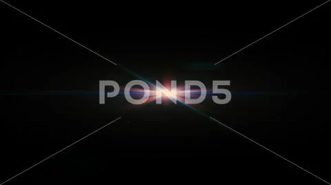 Real Lens Flare Shot in Studio over Black Background. Easy to add as Overlay Stock Photos