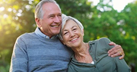 Real life happily ever after. an affectionate senior man embracing his wife Stock Photos