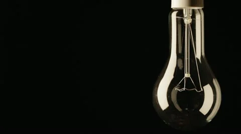 Real light bulb flickering. Stock Footage 21358369