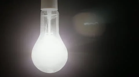 Real light bulb flickering. Stock Footage