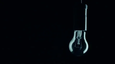 Real light bulb flickering. Stock Footage