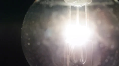 Real light bulb flickering Stock Footage 32001956