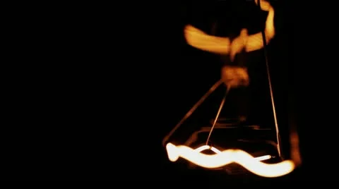 Real light bulb turning on, back lit, close-up Vídeos de archivo 21355593