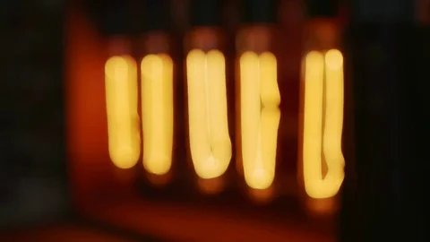 Real light bulb turning on, flickering and turning off. Macro. Stock Footage 81447599