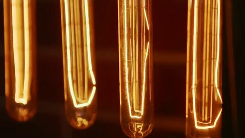 Real light bulb turning on, flickering and turning off. Macro. Video stock 81447641