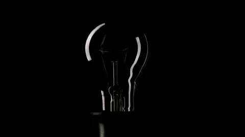 Real light bulb turning on Stock Footage