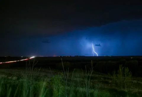 Real lighting bolt over the freeway Stock Photos