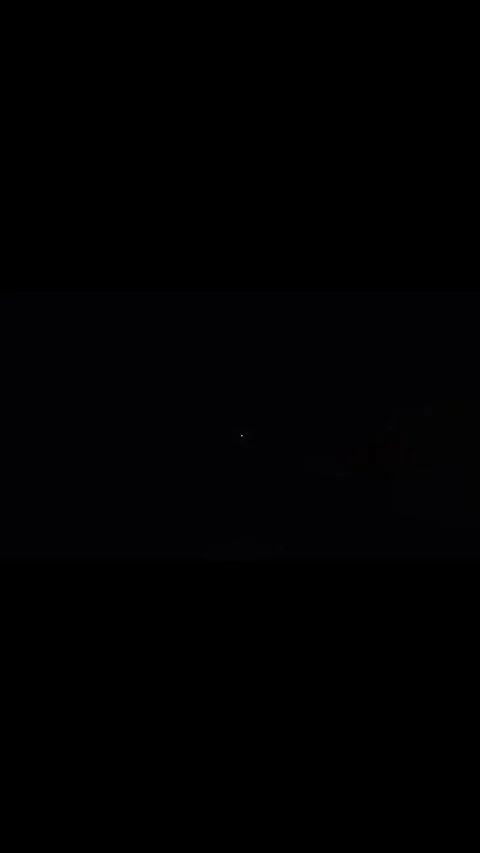 Real long lightning strike across the night sky in 4K Stock Footage 330656168