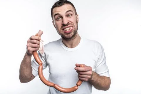 The real man could not be real without the love of eating meat. This guy like Foto stock