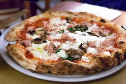 Real Neapolitan pizza fired in a wood burning oven Stock Photos