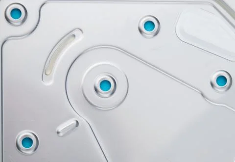 Real open computer hard drive on a blue background Stock Photos