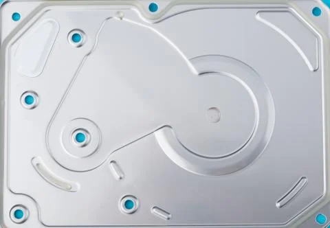 Real open computer hard drive on a blue background 스톡 사진