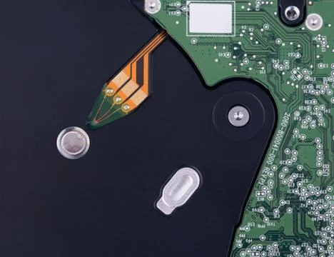 Real open computer hard drive on a blue background 스톡 사진