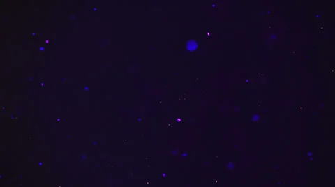 Real particles spinning Stock Footage 32875163