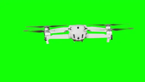 Real Quadcopter with Camera Flights on Green Screen for Alpha Channel Stock Footage 209352534