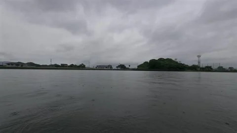 Real Rain Drops Hitting Lake Surface with Audio ASMR 4K - Fukuoka Japan Stock Footage 336532587
