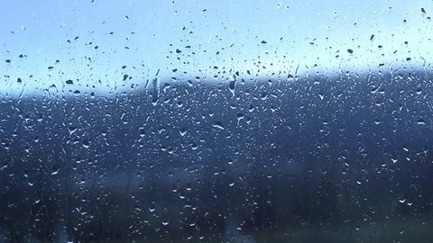 Real Rain Drops Sliding On Window Glass Stock Footage 124009969