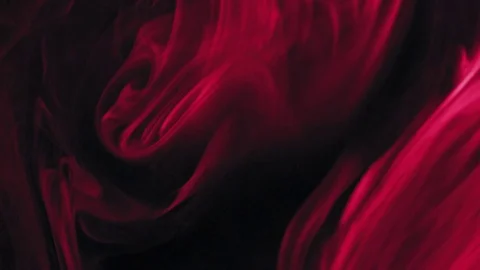 Real red smoke on balck background - ideal for transition or background Stock Footage 74806341