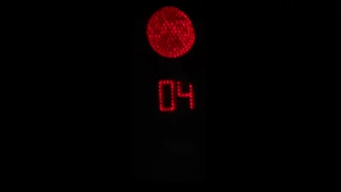 Real road traffic light with countdown timer, telephoto close-up Stock Footage 323864408