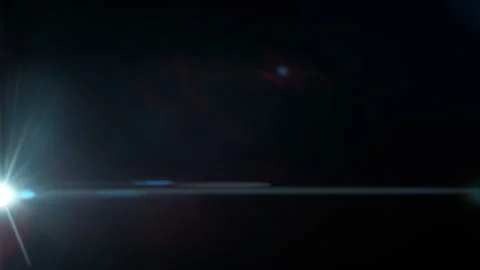 Real Shooted Anamorphic Lens Flare on Black Background in Super Slow Motion. Stock Footage 341834107