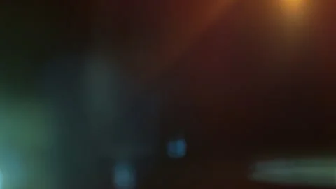 Real Shooted Anamorphic Teal and Orange Lens Flare on Black Background in Super Stock Footage 341834338