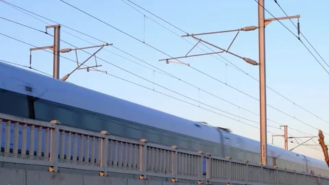 Real shot of a high speed train gracefully passing by Stock Footage 304217881