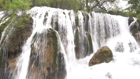 Real Shot of Large Waterfall Scenery in Jiuzhaigou Sichuan China Stockbeeldmateriaal 336887204