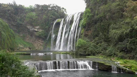 Real Shot of Multi step Waterfall Group of Huangguoshu Waterfall in Guizhou Video stock 336892927