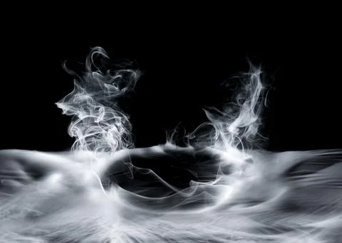 Real smoke exploding and swirling outwards. Dramatic smoke or fog effect fo.. Stock Photos