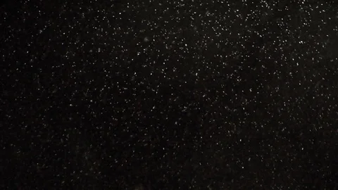 Real snow falling on black background | Stock Video | Pond5