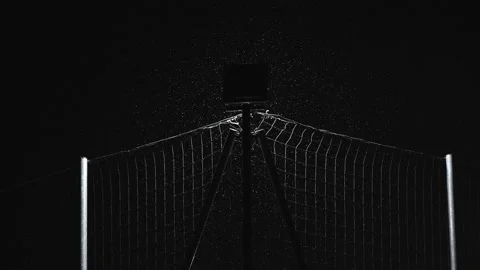 Real Snow Falling at moody winter night, on black background in 4K Stock Footage 231764677