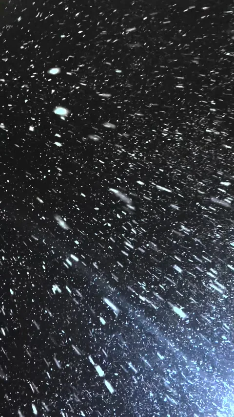 Real snow falls on camera. Falling snow. Heavy snowfall video. Winter fairy tale Stock Footage 261222588