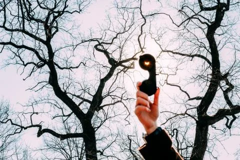 Real Solar Eclipse On March 20, 2015. Moon Covering Sun In Partial Eclipse. Fotos Stock