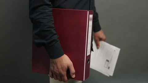 Real State Agent Holding File Folder And Documents Stock Footage 132917906